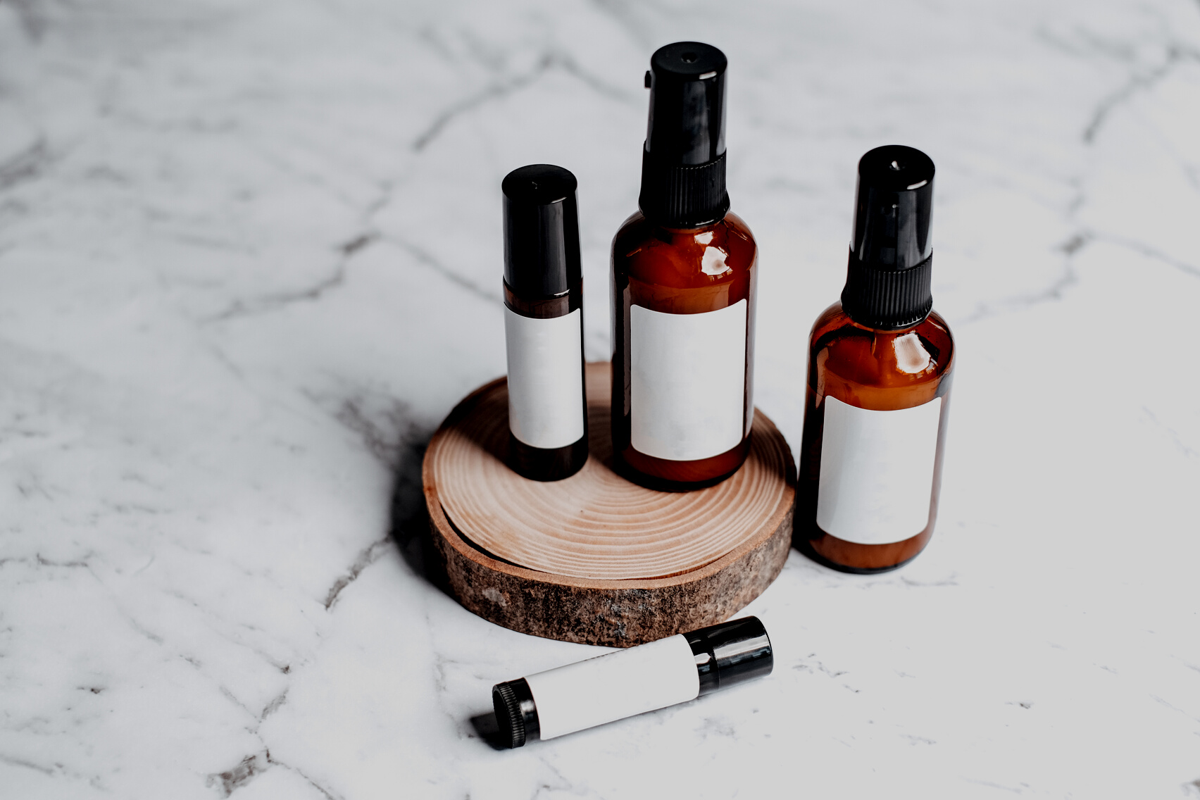 Skin Care Products on Brown Round Wood 